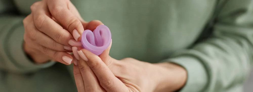 position cup menstruelle